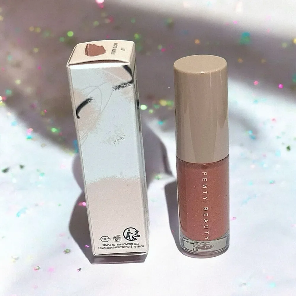 FENTY BEAUTY Gloss Bomb Universal Lip Luminizer in FENTY Glow .07 Oz New In Box